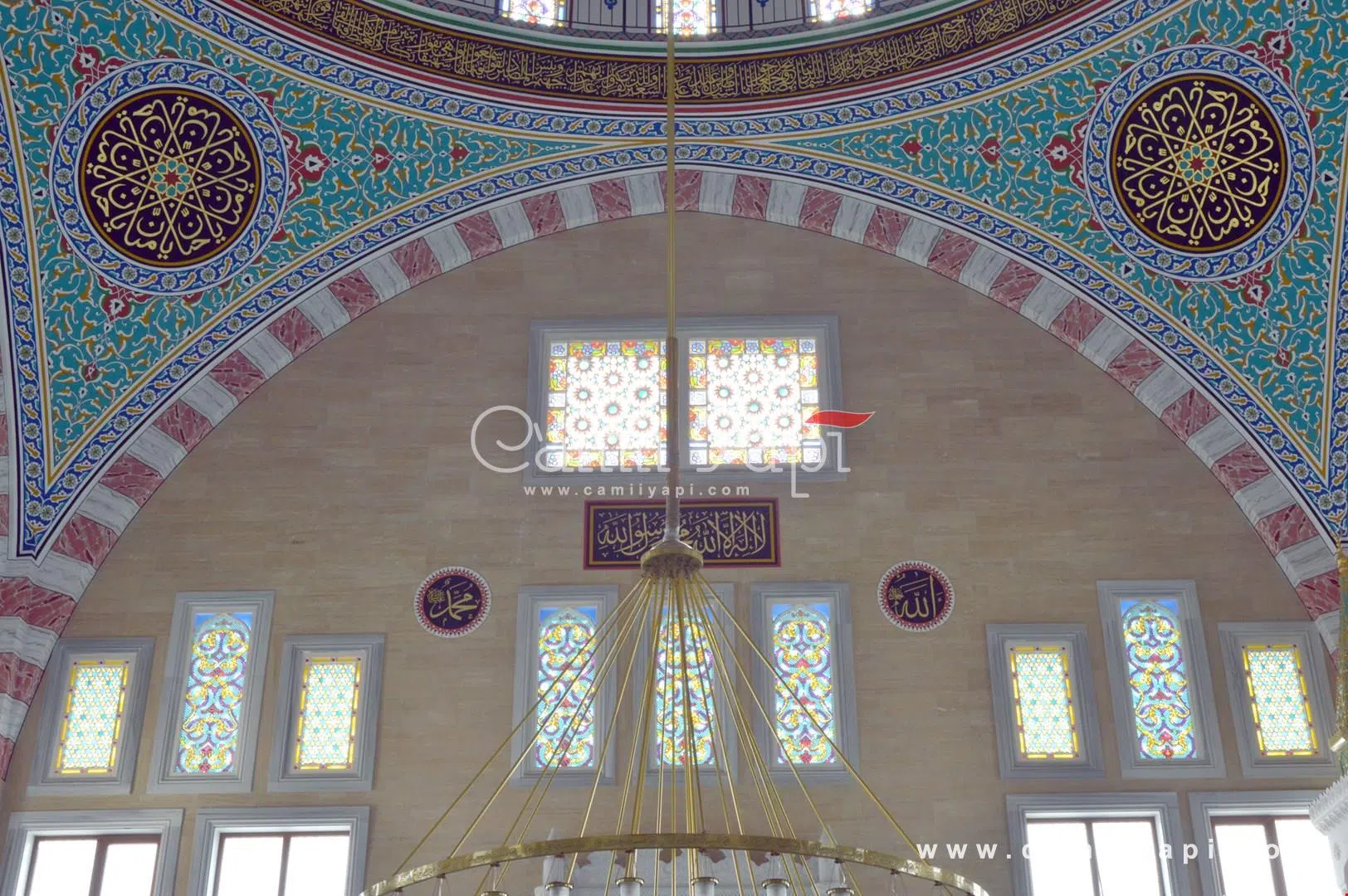 Stained-glass windows and the mosque’s interior dome