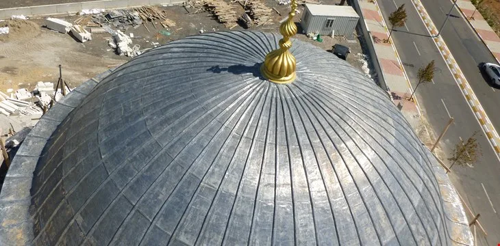 Metal dome cover and finial seen from above