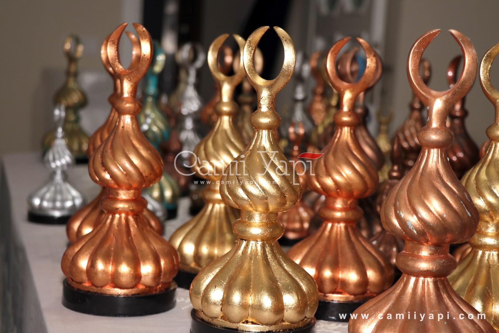 Copper and gold colored decorative mosque finials